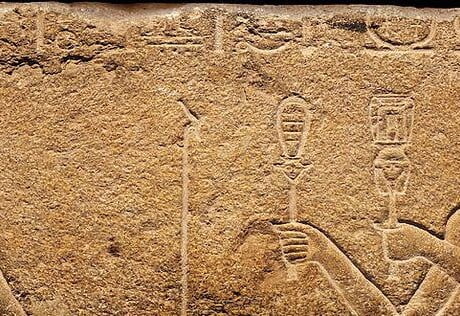 Egyptian relief. Caesarion is presenting gifts to the goddess Isis.